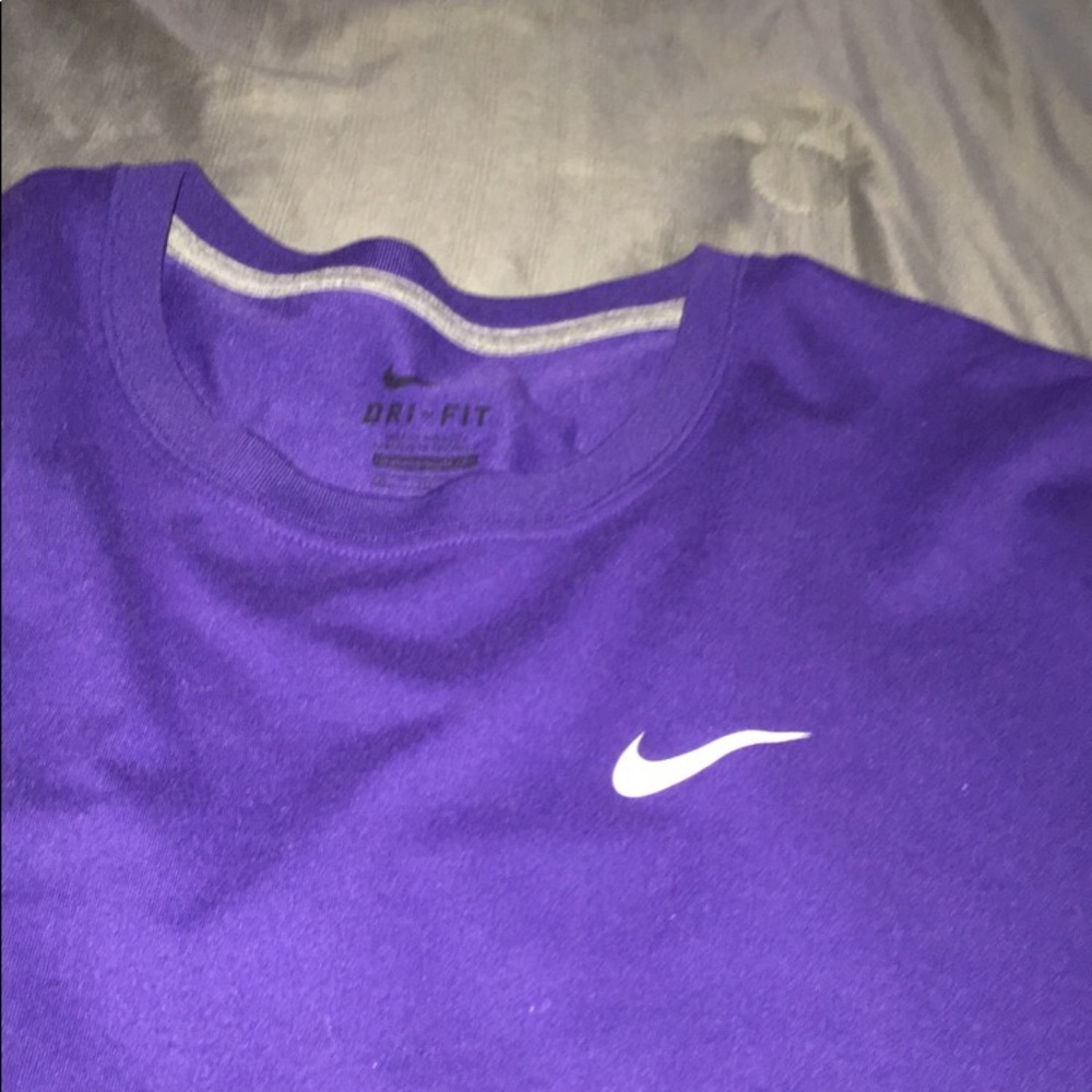 purple nike shirt